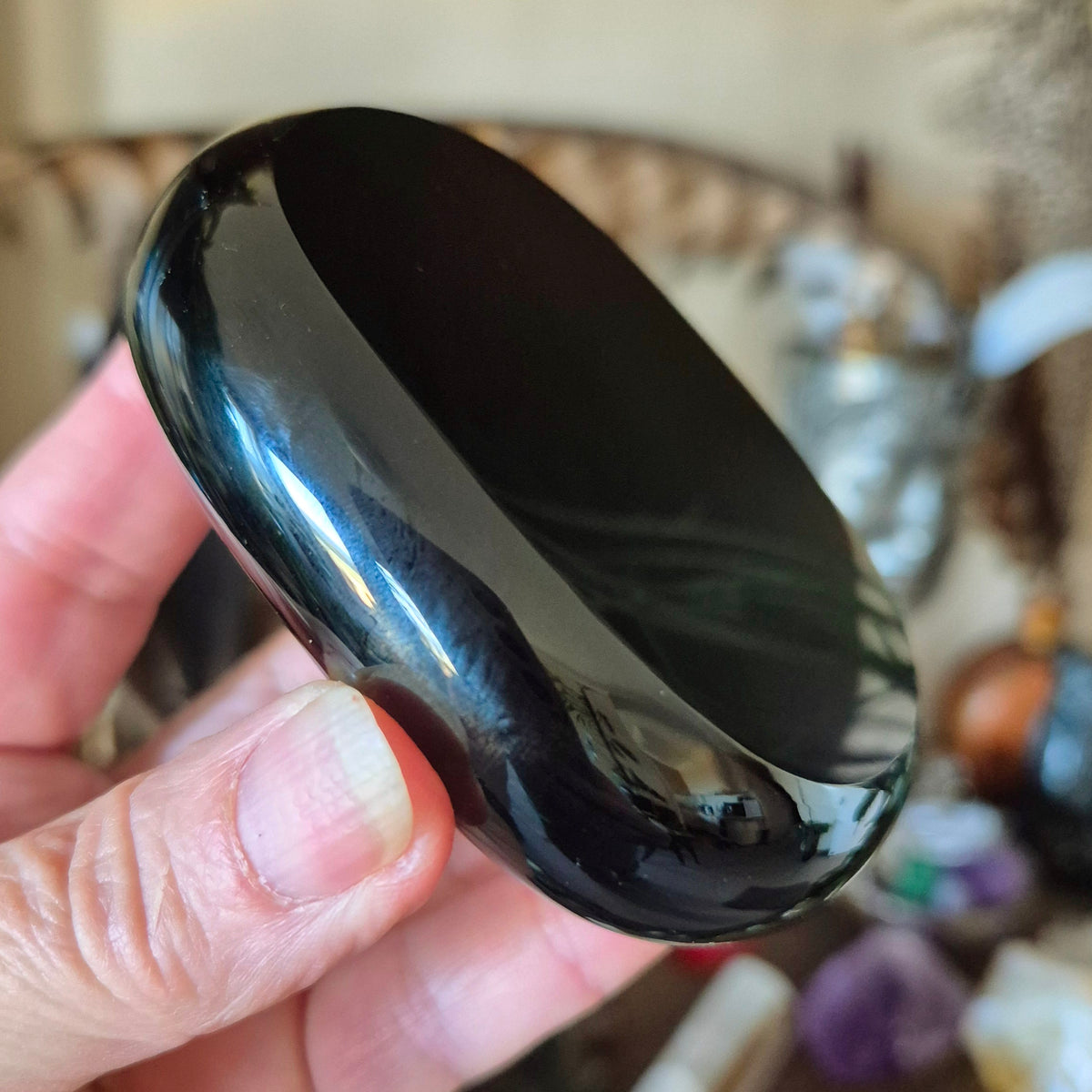 black oval crystal stone