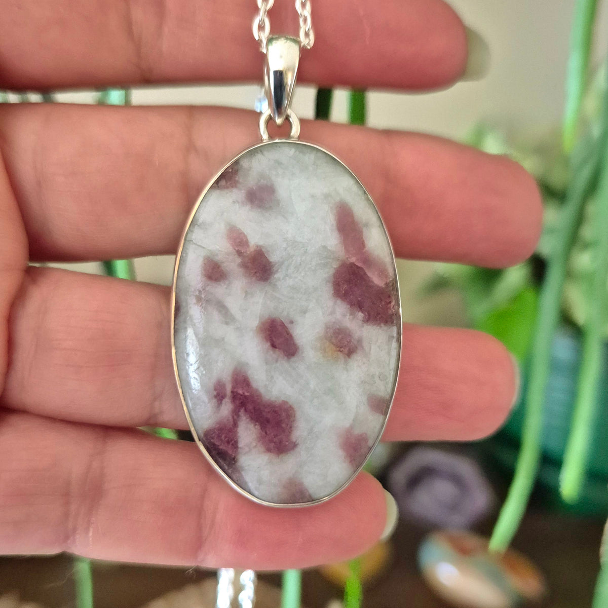 oval pink tourmaline crystal set in silver