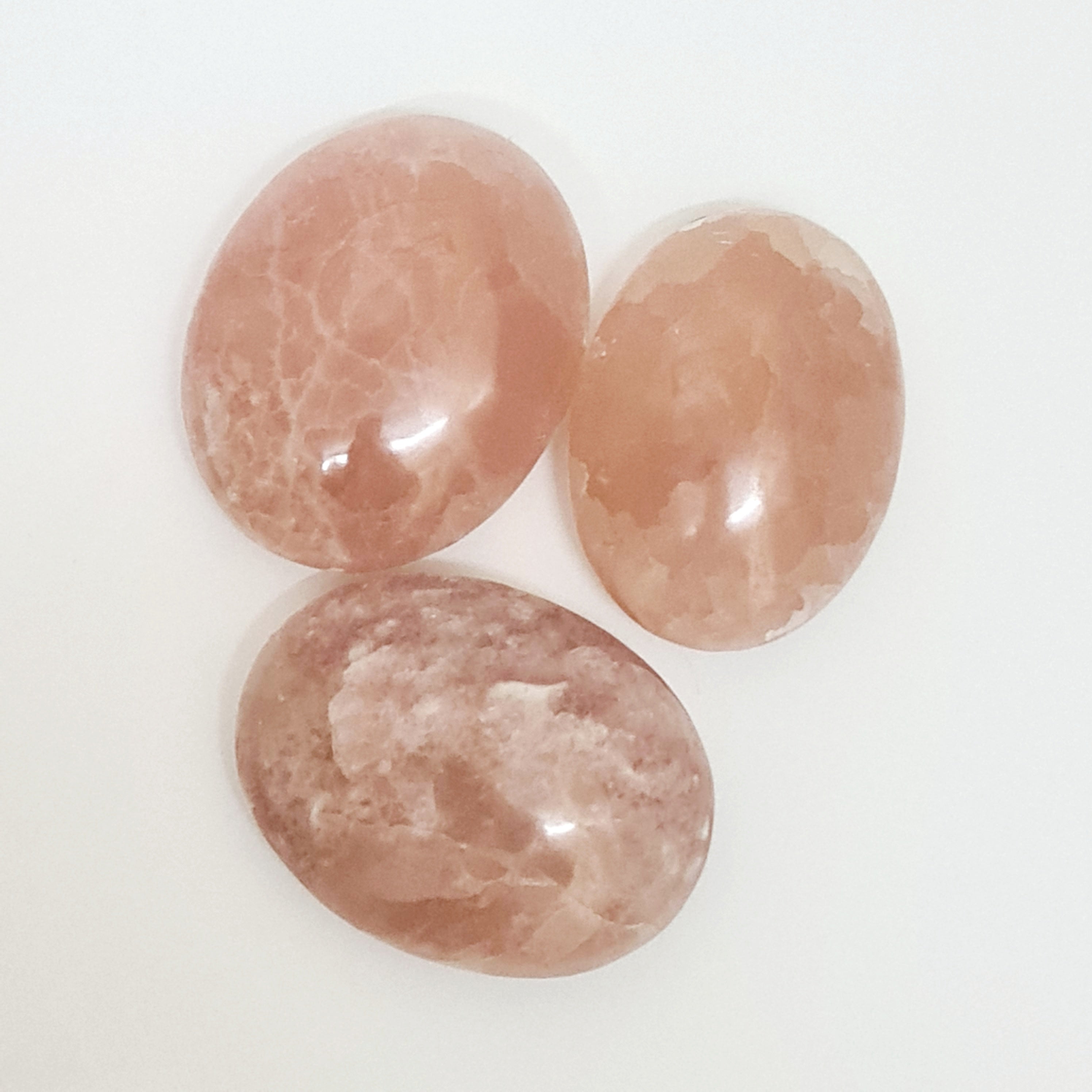 STRAWBERRY CALCITE PALM STONE