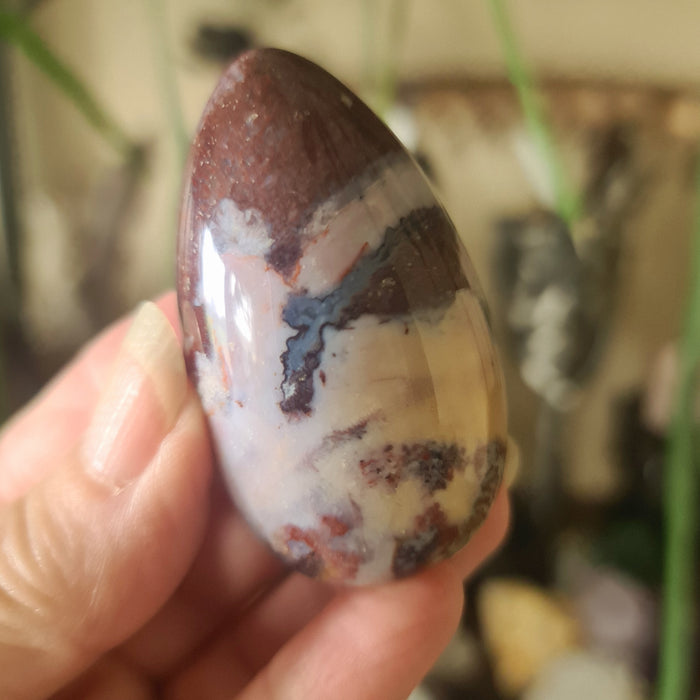 agate crystal stone held in a hand