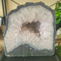 Amethest cave with druzy and blurred background