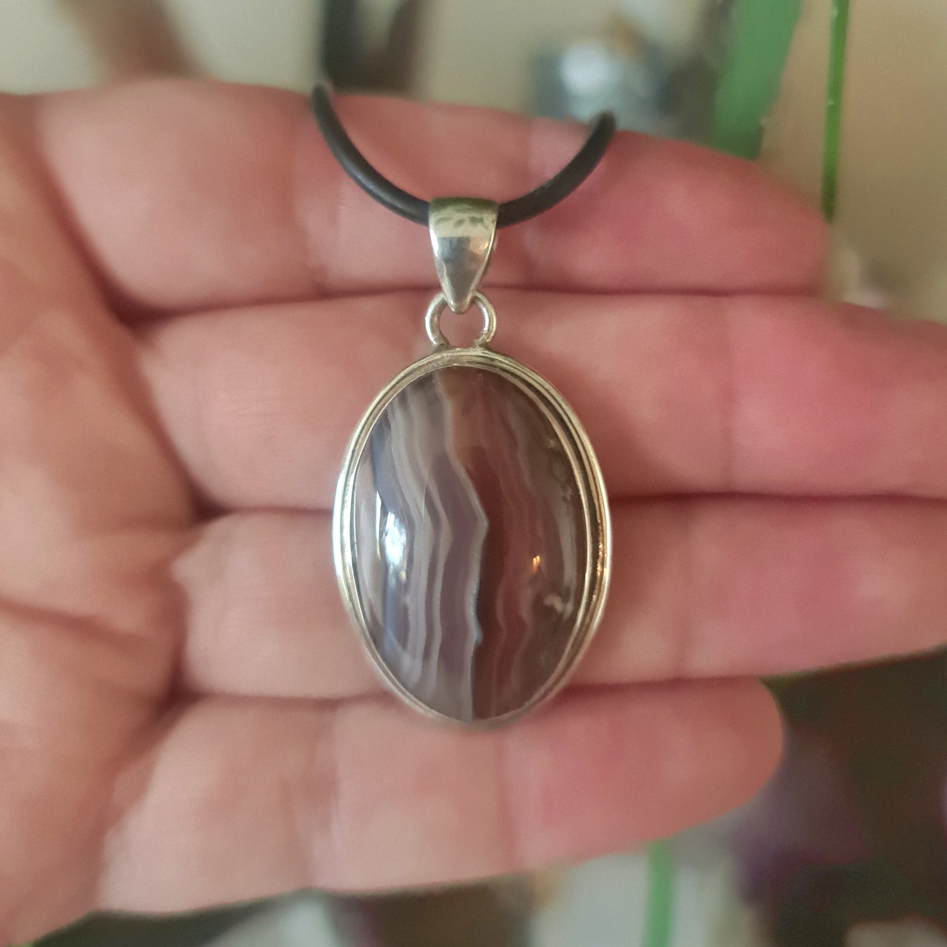 banded brown and white oval pendant set in sterling silver