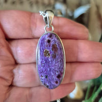purple crystal set in sterling silver