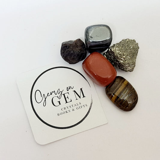 A collection of various colored gemstones and crystals displayed on a card with 'Gemz on Gem' branding.