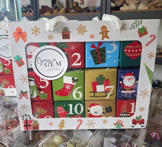 Advent calendar with colorful boxes and Christmas-themed designs, featuring the brand 'Gemz of Gem'.