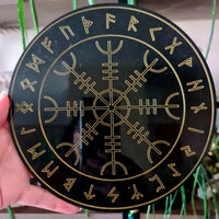 A 20cm acrylic crystal grid with a geometric pattern and gold text, held in a person's hand.