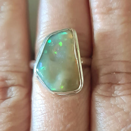 opal set in sterling silver on hand