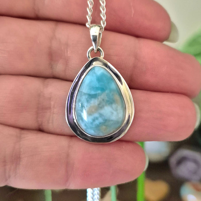 blue teardrop crystal set in silver