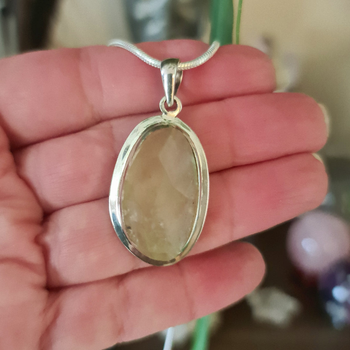 pale crystal set in sterling silver