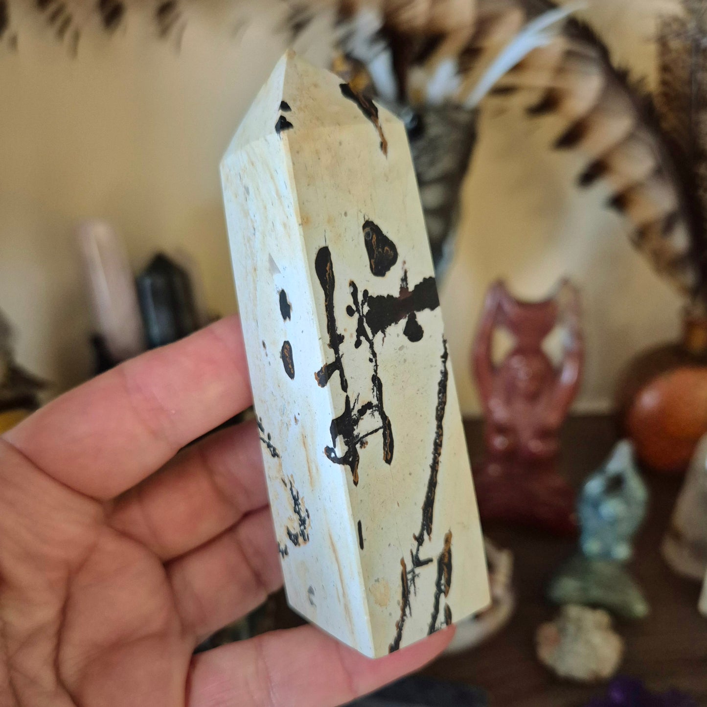 beige tower with blank scribbly lines