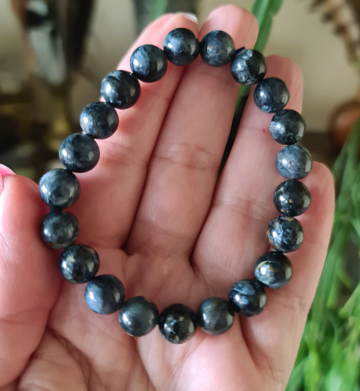 blue crystal beaded bracelet in hand