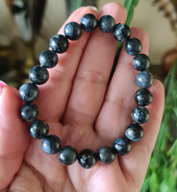blue crystal beaded bracelet in hand