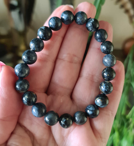 blue crystal beaded bracelet in hand