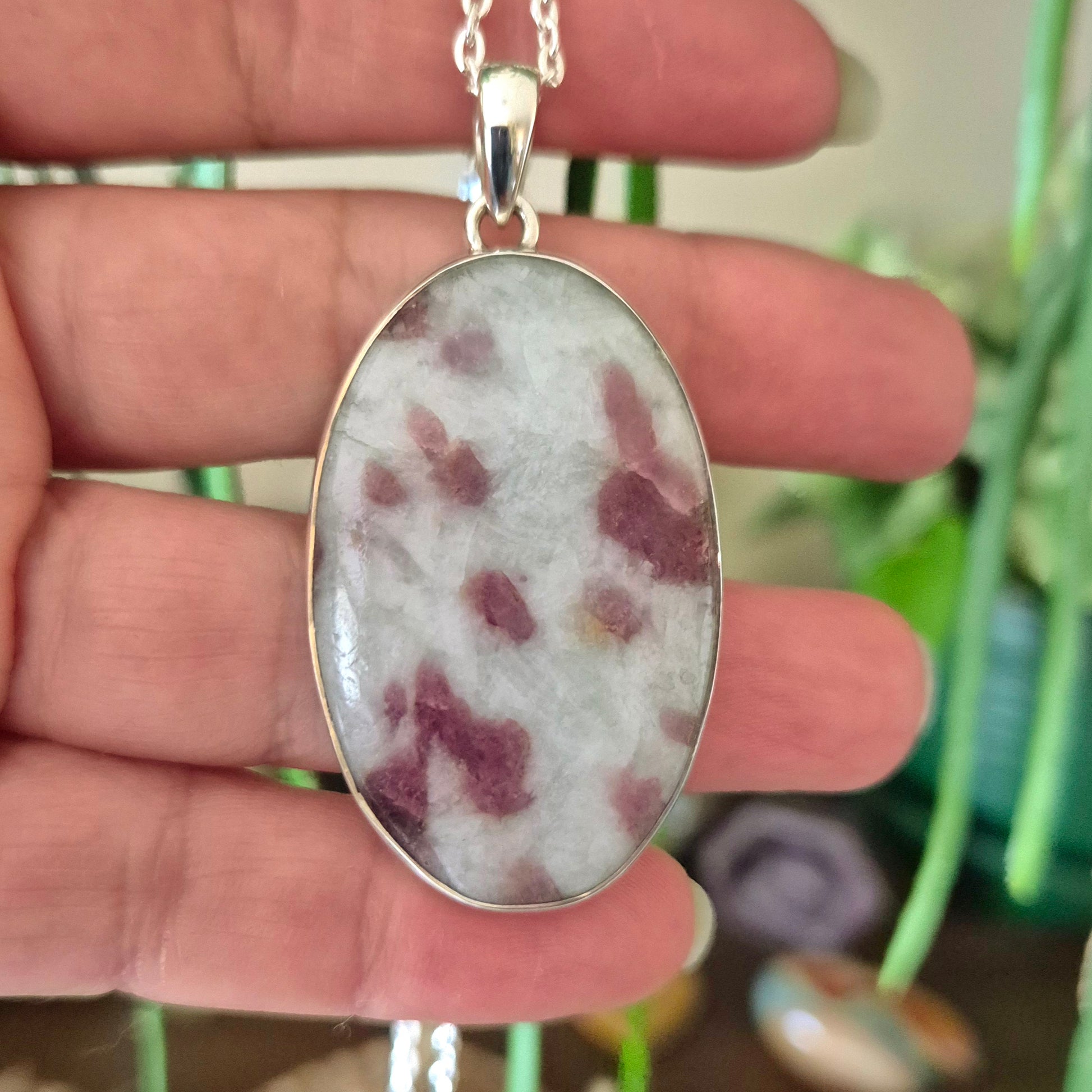 oval pink tourmaline crystal set in silver