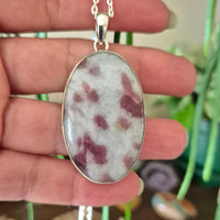 oval pink tourmaline crystal set in silver
