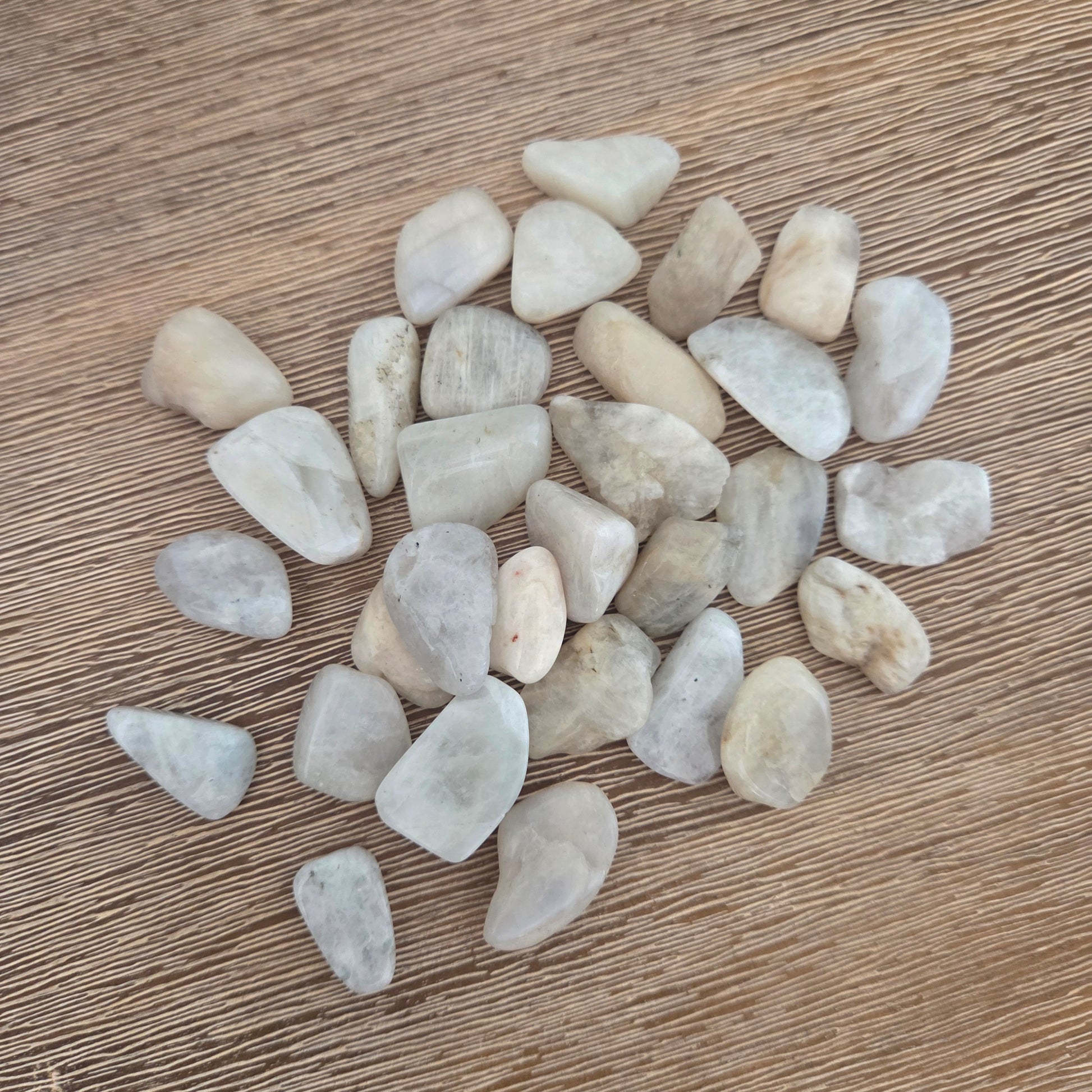 Small stones on a wooden surface