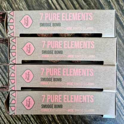 A box labeled '7 Pure Elements Smudge Bomb' with text indicating the product is a sage smudge bomb, meant for spiritual cleansing and clearing, with properties of calm, positivity, and spiritual clarity.