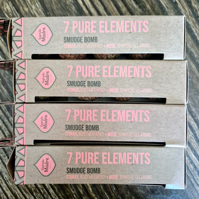 A box labeled '7 Pure Elements Smudge Bomb' with text indicating the product is a sage smudge bomb, meant for spiritual cleansing and clearing, with properties of calm, positivity, and spiritual clarity.