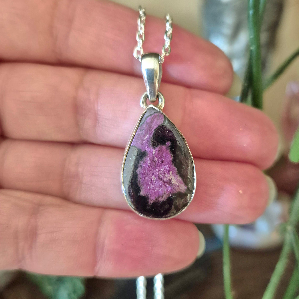 Sugalite Pendant with tones of black and purple set in sterling silver