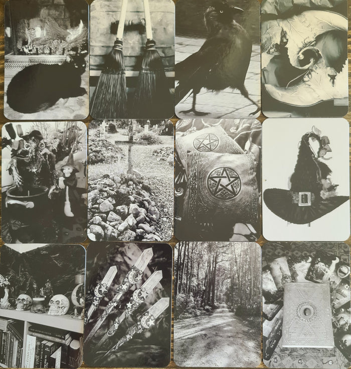 A collection of 37 black and white illustrated cards with various mystical and spiritual symbols, sold in a soft black fabric pouch.